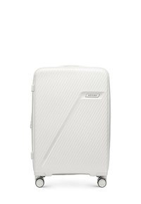 White hard-shell suitcase with diagonal ridges, top handle, and zipper closure. Features four wheels for mobility and a small logo accent.