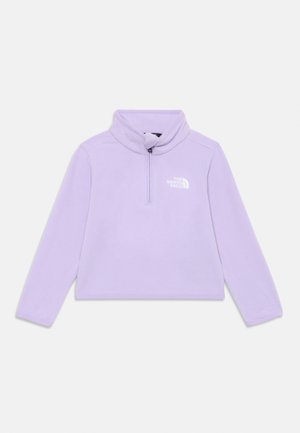Pull en polaire lilas avec zip quart de fermeture et col montant, avec le logo blanc The North Face sur la poitrine gauche et des manches longues.