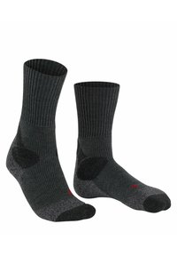 Chaussettes gris foncé avec une texture côtelée, orteil et talon renforcés et accents noirs contrastants. Logo rouge sur le côté.