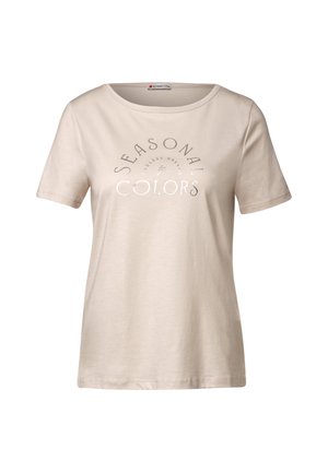 Lichtbeige t-shirt met korte mouwen, gemaakt van zachte katoen, met een geprinte tekst in zilver met de woorden "SEASONAL ENDLESS DREAMS COLORS".