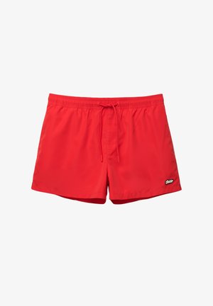 Piros fürdőnadrág könnyű anyagból, elasztikus derékkal és zsinórral, kis logóval a bal elülső oldalon.