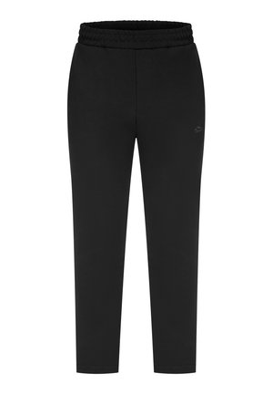 Pantalons de sport noirs avec une taille élastique. Fabriqués en tissu lisse, présentant une coupe fuselée et un discret logo sur le côté.