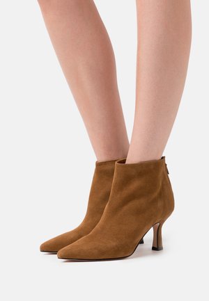 Bianca Di, Boots à talons - cognac
