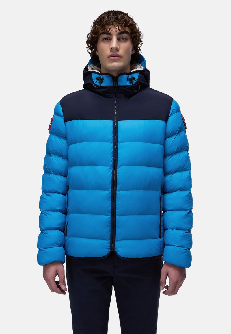 Giacca imbottita di un vivace blu con colletto blu navy, dotata di zip frontale, cappuccio e tasche laterali. Motivo a quadretti su tutta la superficie.