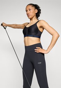 triaction by Triumph ENERGY LITE - Sports-BH-er med medium støtte - black