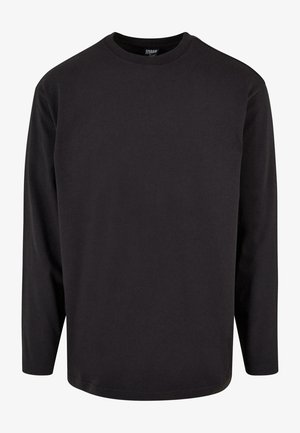 Juodas ilgomis rankovėmis T švarkas, pagamintas iš minkštos medvilnės. Savybės: apvalus iškirpimas ir tiesus apvadas. Paprastas dizainas, be matomų raštų ar aksesuarų.