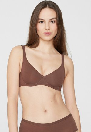 Reggiseno wireless marrone in tessuto liscio con spalline regolabili, caratterizzato da una forma strutturata e coppe senza cuciture per il massimo comfort.