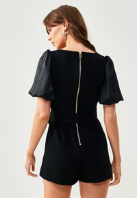 BWLDR ALETTE PLAY - Kombinezonas - black