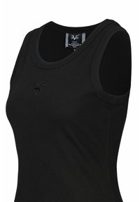 Schwarzes Rippen-Top mit rundem Kragen und ärmellosem Design. Verfügt über ein dezentes, geprägtes Logo auf der Vorderseite.