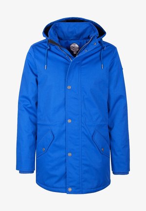 Veste imperméable bleue avec capuche, fermeture éclair et boutons, deux poches avant, et poignets côtelés. Texture lisse et design décontracté.