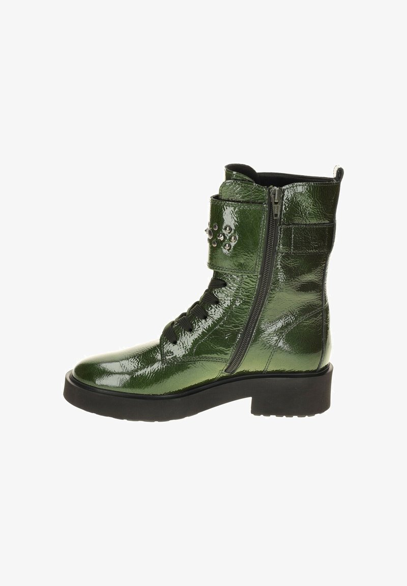 Green patent leather ankle boot with a textured finish, lace-up front, side zipper, and decorative studs on the strap. Chunky black sole.