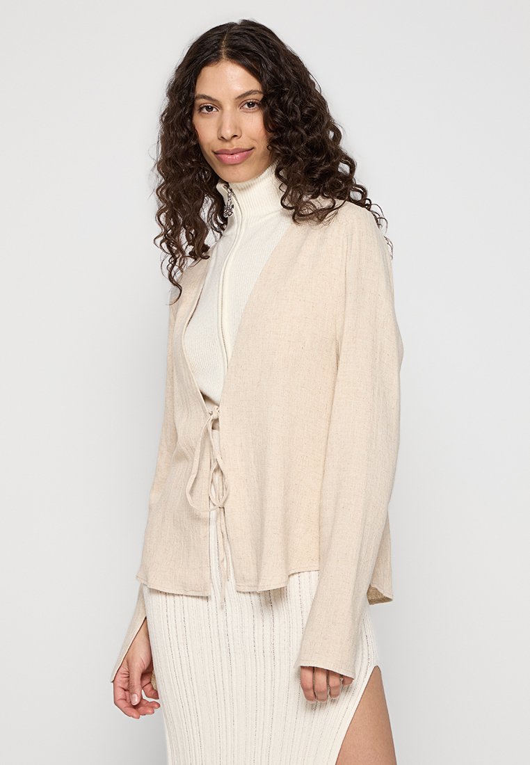 ALOHAS Lichte jas beige