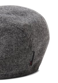 Szara filcowa czapka o zaokrąglonym kształcie, z teksturowaną powierzchnią i małą czarną metką z napisem "Gottmann." Prosty i minimalistyczny design.