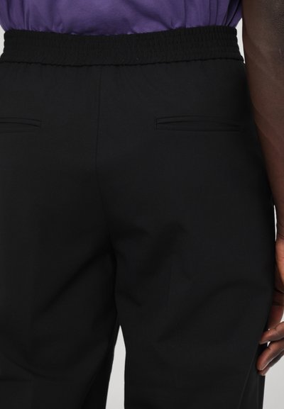 Bonsai LOOSE PANT UNISEX - Nohavice - black