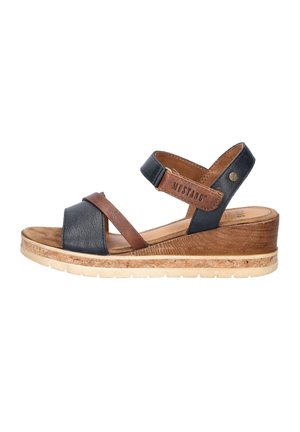 Women's wedge sandal with black and brown leather straps, cork sole, and "Mustang" logo on ankle strap.