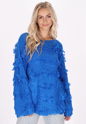 - Sweter