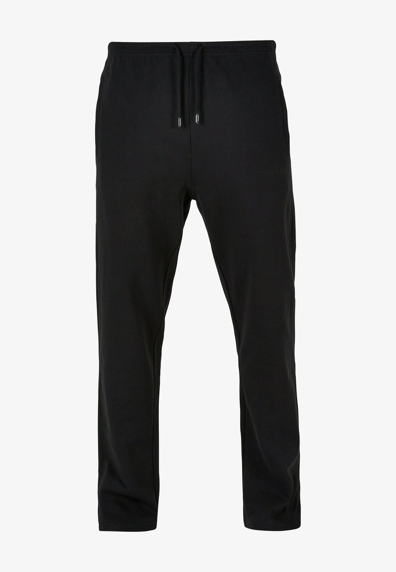 Zwarte sweatpants van een zachte katoenmix, met een elastische tailleband met trekkoord, rechte pijpen en zonder zichtbare patronen of accenten.