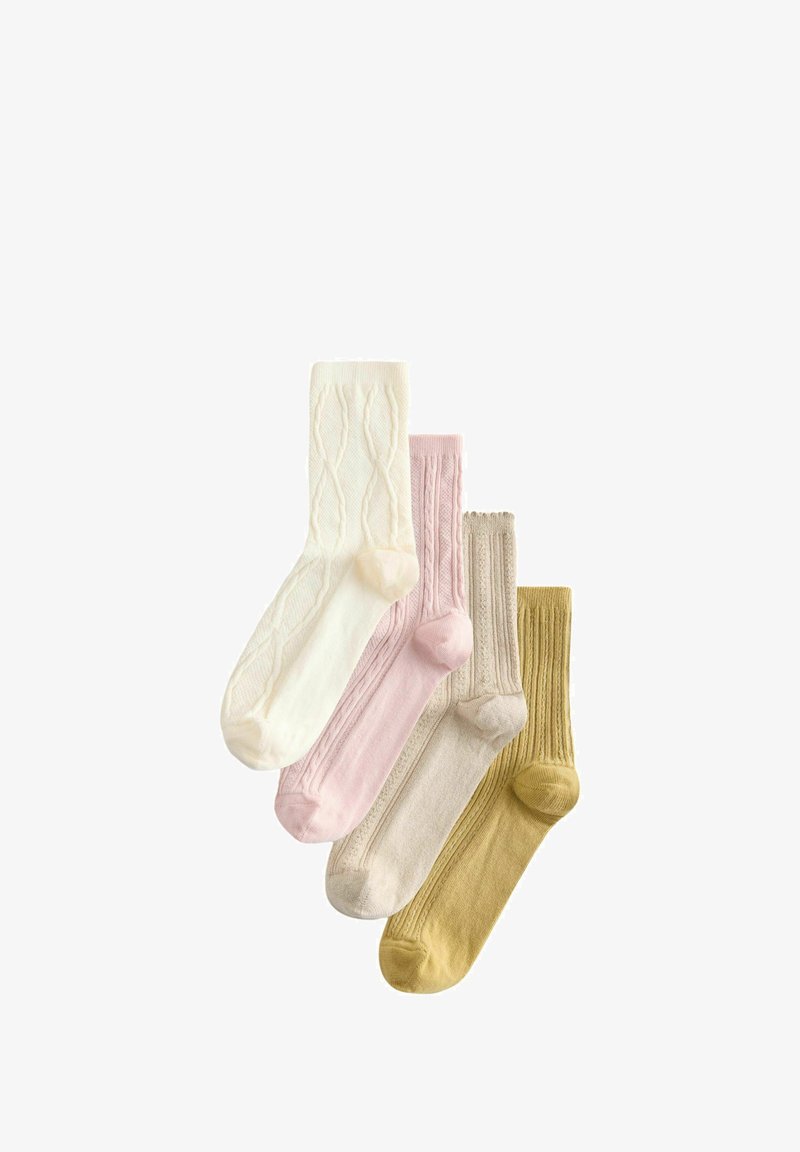 Quatre paires de chaussettes en maille texturée dans des tons crème, rose clair, beige et jaune moutarde, disposées en chevauchement sur un fond blanc.