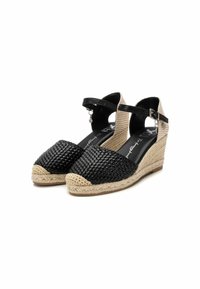 Espadrillas con tacco a wedge in tessuto intrecciato nero, con suola intermedia in corda di juta, cinturino alla caviglia regolabile e dettagli in pelle nera sul tallone.