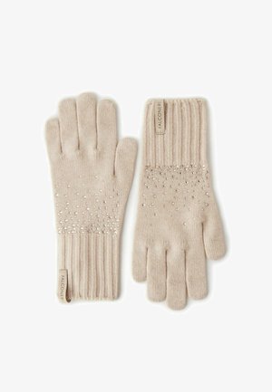 Beżowe rękawiczki z dzianiny z prążkowanymi mankietami, ozdobione srebrnymi cekinami na nadgarstkach. Na mankiecie wszyta metka z napisem "FALCONERI".