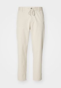 Pantalones ligeros beige con una cinturilla elástica y cordón. Diseño de pierna recta con una textura suave y sin patrones visibles.