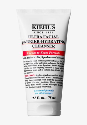 Kiehl's Ultra Facial Barrier-Hydrating Cleanser in einer 75 ml weißen Tube. Sie verfügt über einen auffälligen roten Text, eine Creme-zu-Schaum-Formel und blaue Akzente.
