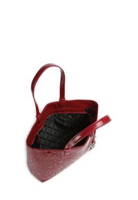 Borsa tote in finta pelle rossa con motivo a logo impresso, due manici e interno foderato in nero con scomparto con zip.