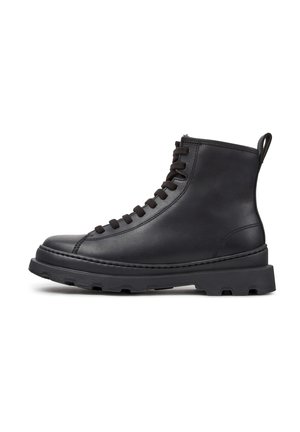 Black leather high-top boot with thick rubber sole, round toe, and lace-up front, shown from the side on a white background.