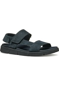 Sandali da uomo in suede blu scuro con cinturini regolabili e suola in gomma nera. Design con punta e tallone aperti. Costruzione leggera.