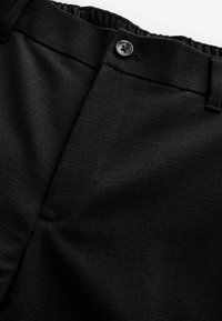 REGULAR FIT - Pantaloni - black