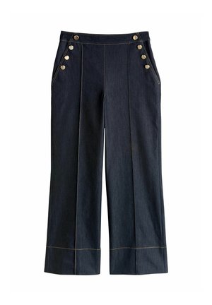Pantalon bleu foncé à jambes larges avec des boutons dorés sur les poches et des détails de coutures verticales le long des jambes.