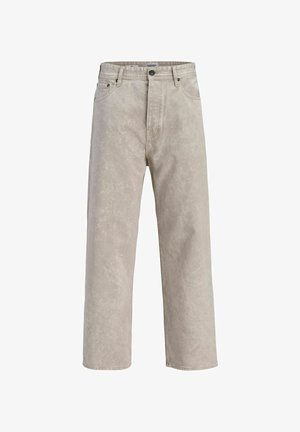 Beżowe szerokie dżinsy z miękkim, teksturowanym wykończeniem. Posiadają klasyczny krój z pięcioma kieszeniami oraz zapięcie na guzik w pasie.