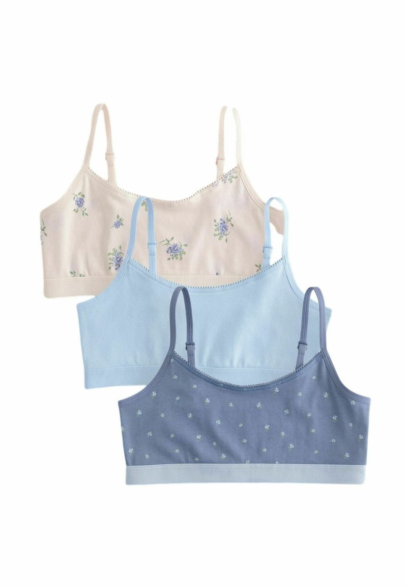 Trois soutiens-gorge en coton doux de couleur pastel : rose clair avec un imprimé floral, bleu clair et bleu foncé avec de petits pois blancs. Bretelles réglables.