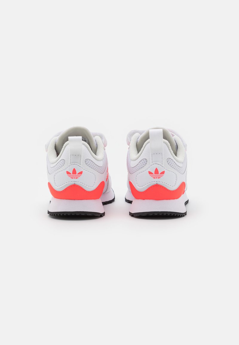 adidas Originals ZX 700 HOODED - Trainers - footwear white/turbo/white  tint/white - Zalando.ie
