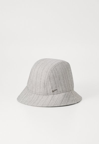 Hallituspruun kork, millel on tekstuuriline herringbone muster ja väikesed punktaktsendid, lai äär ja õmmeldud riba alumises osas.