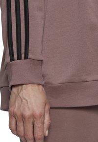 adidas Performance Jersey con capucha - mauve