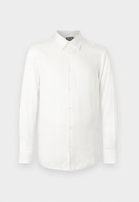 Hvit skjorte med lange ermer, vertikale striper, krage med knapper og avrundet nederkant. Laget av glatt stoff med subtile teksturdetailler.