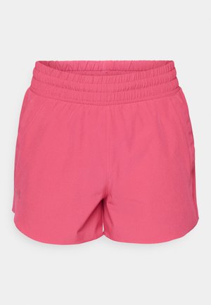 Rožinės sportinės šortai su elastinga juosmens juostele, pasižymintys lygiu tekstūru ir nedideliu tamprumu. Du šoniniai kišeniai integruoti į dizainą.