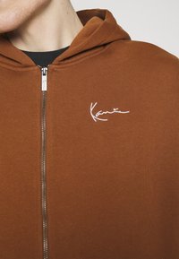 Karl Kani Sudadera con cremallera - brown