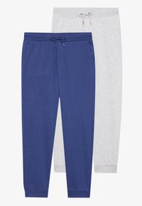 Zwei Paar Hosen: eine marineblaue, eine hellgraue. Beide verfügen über Seitentaschen, elastische Taillenbunde und sind aus weichem, glattem Stoff gefertigt.
