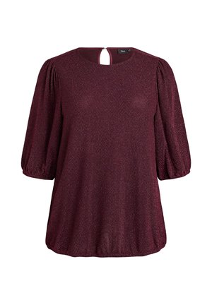 Blusa bordeaux con un motivo texture, collo rotondo, schiena a chiave e maniche a sbuffo tre quarti. Tessuto morbido con leggero lucido.