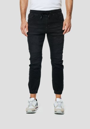JOGGER - Vaqueros slim fit - black denim