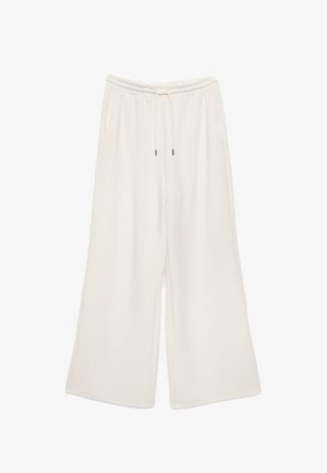 Spodnie o szerokich nogawkach w kolorze kremowym, z elastycznym pasem i sznurkiem, posiadające boczne kieszenie i luźny krój.