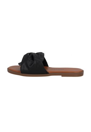 Sandalo in pelle nera con design anteriore annodato, suola piatta marrone e punta aperta per una facile vestibilità.