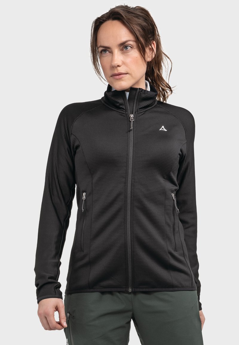 Schwarze Zip-Up-Jacke mit strukturiertem Muster, hohem Kragen und zwei seitlichen Taschen. Mit kleinem Logo auf der Brust und langen Ärmeln.