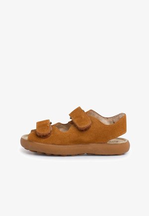 Brown suede sandal with two adjustable Velcro straps, open design, round toe, and rubber sole. Features a cushioned inner lining.