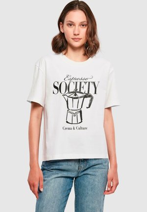Bela bomba iz bombažnega materiala z grafiko črnega špinetnega aparata za espresso in besedilom "Espresso Society" ter "Crema & Culture" spodaj.