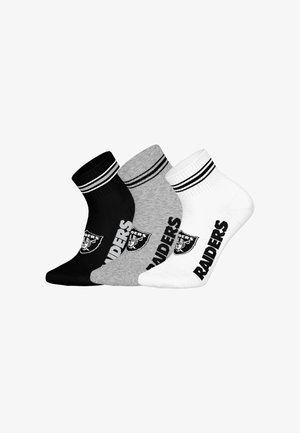 Three pairs of crew socks in black, gray, and white. Each sock has a ribbed cuff and features the word "RAIDERS" and a logo in contrasting colors.