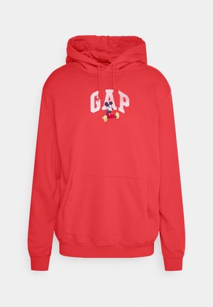 Punainen huppari, jossa on etutasku, kiristettävä huppu ja kirjailtu "GAP"-logo alla olevaan sarjakuvahahmoon. Sileä pinta, rento istuvuus.