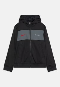 Black zip-up hoodie with gray chest panel, red Nike swoosh on left, white "AIR" text on right, front pockets, and attached hood.